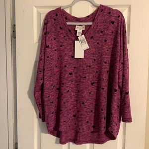Purple sweater with black hearts